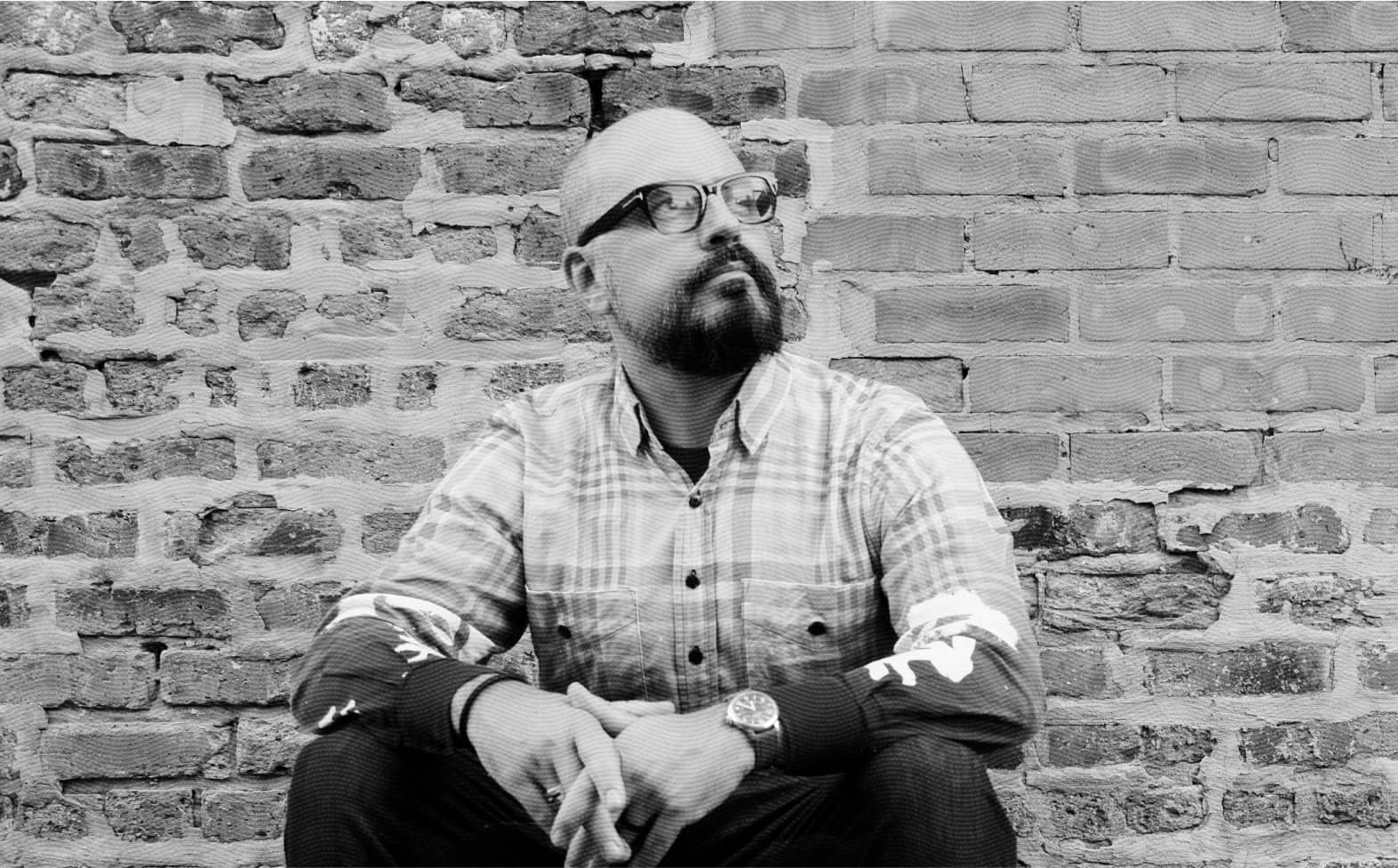 Black and white portrait photograph of Kieran Ots, founder of Make No Small Things